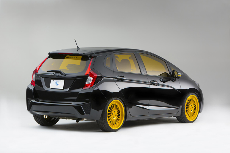 Illustration for article titled A Honda Fit With A Grom In The Back Is Something We Need Yesterday